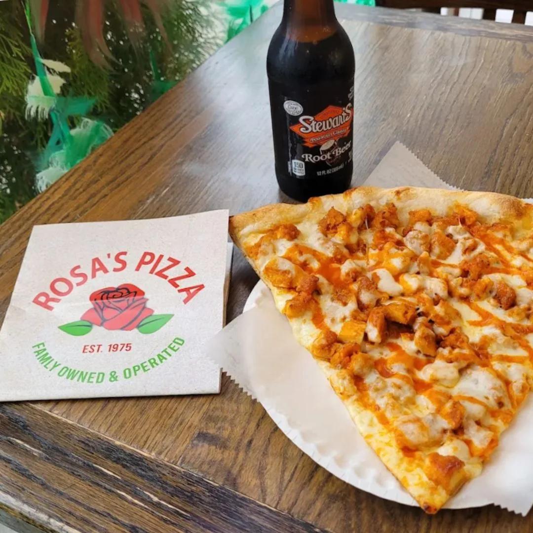 Buffalo chicken slice on a Rosa's Pizza napkin