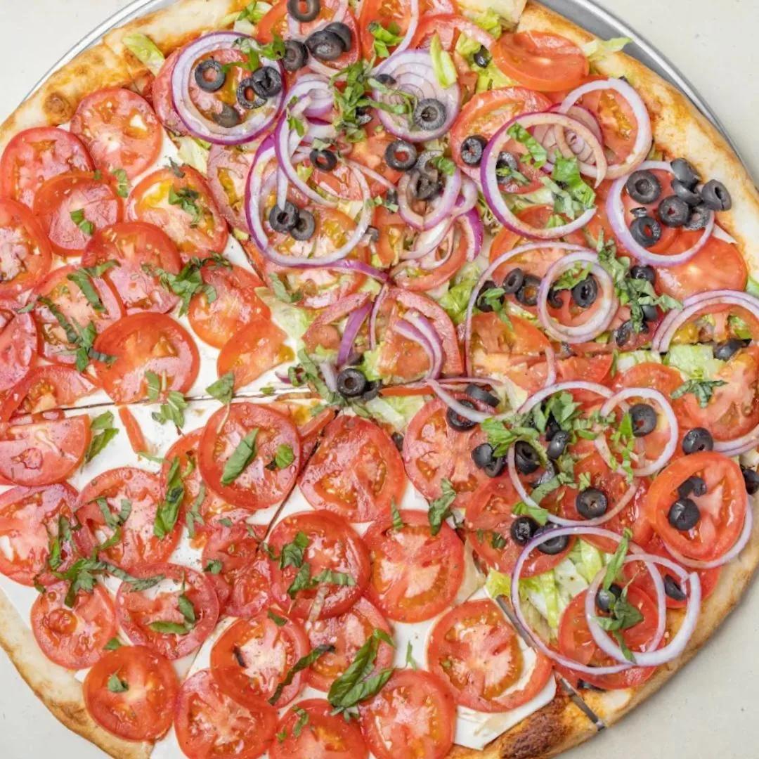 Salad pie with tomato, onion and olives