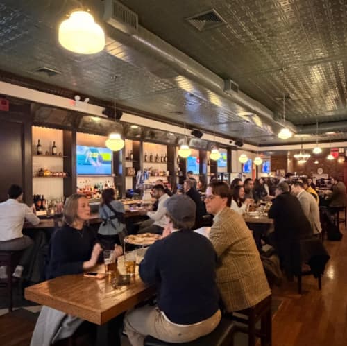 A full dining room on a busy night