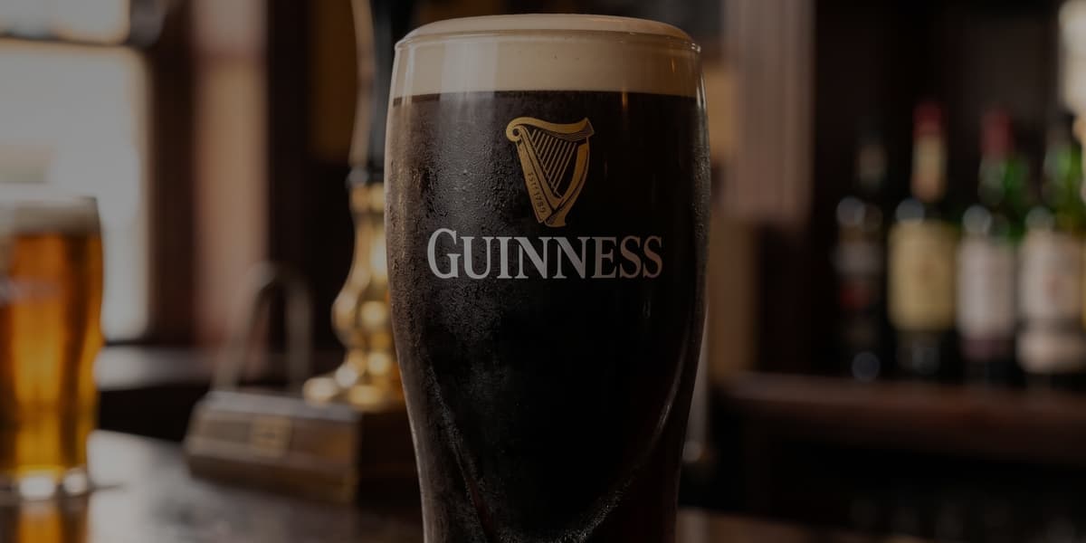 A fresh pint of Guinness on the bar
